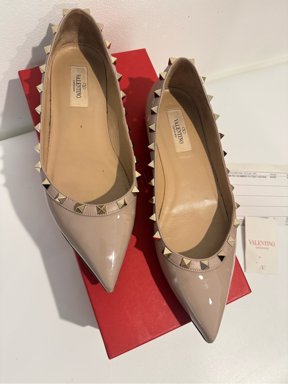 These Valentino Garavani Rockstud Pointed Toe Ballerina Flats nude size 8